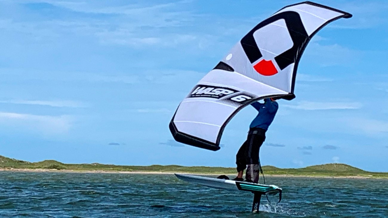 A person windsurfing