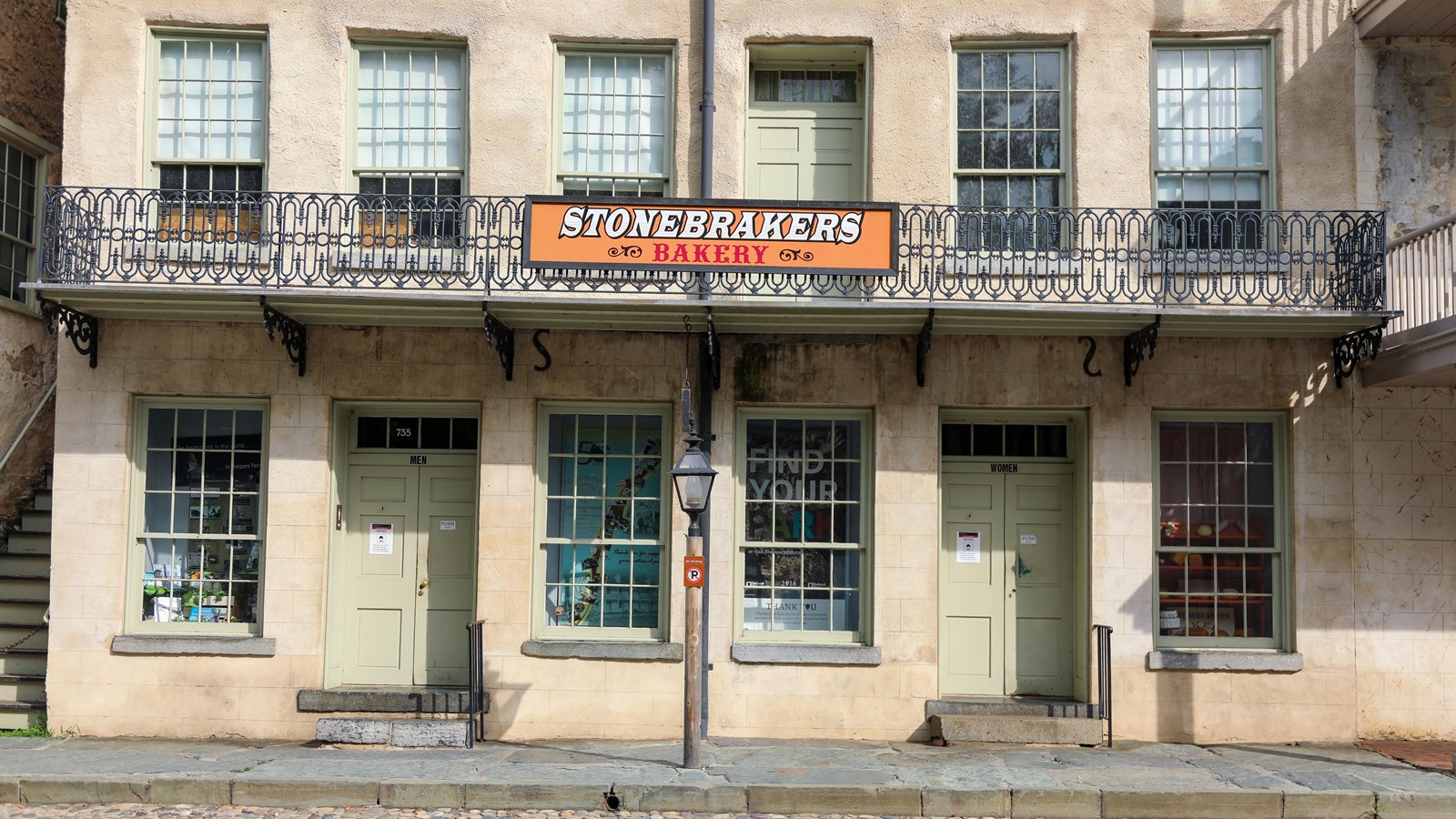 An orange sign reading