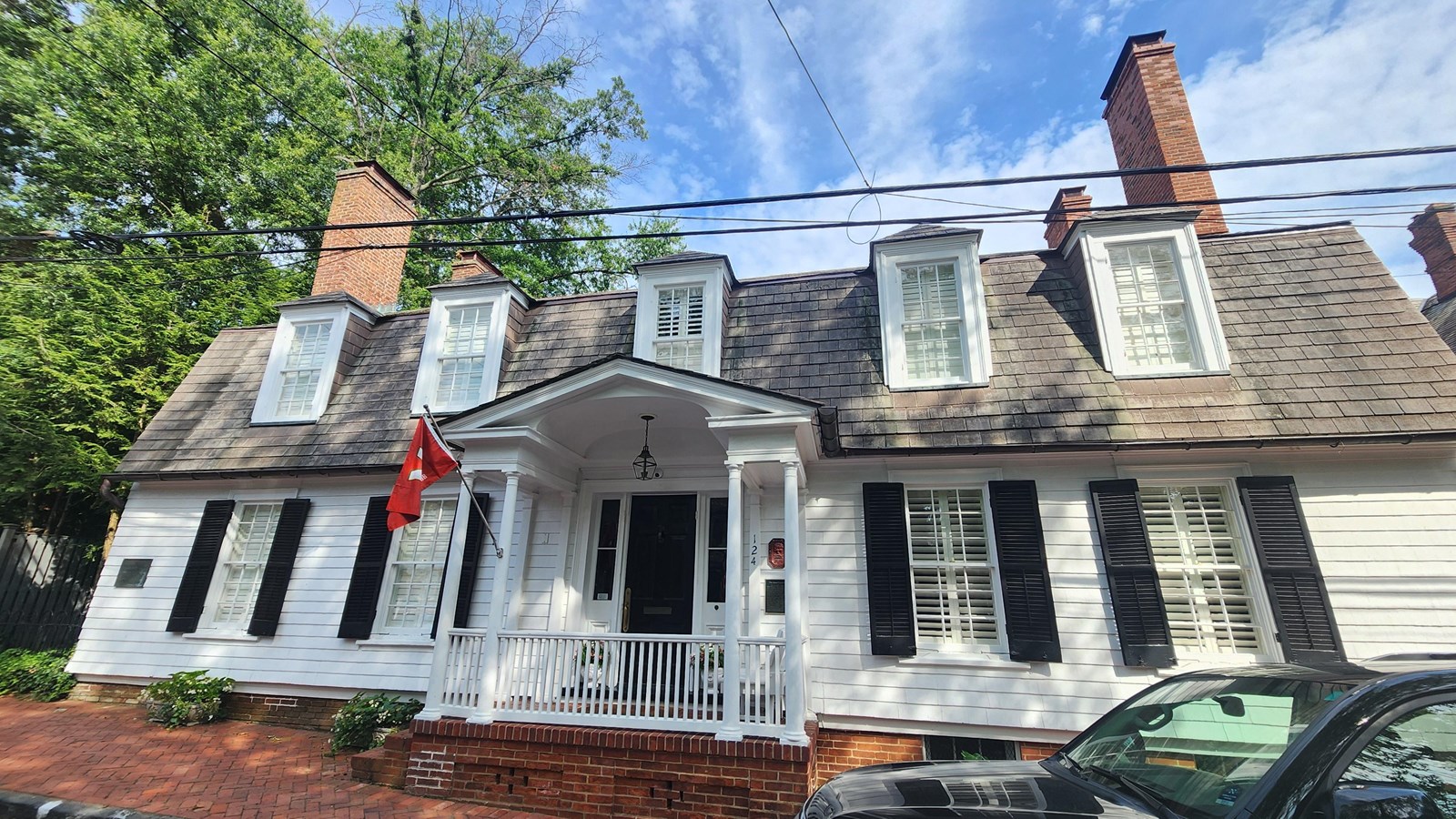 A white clapboard house.