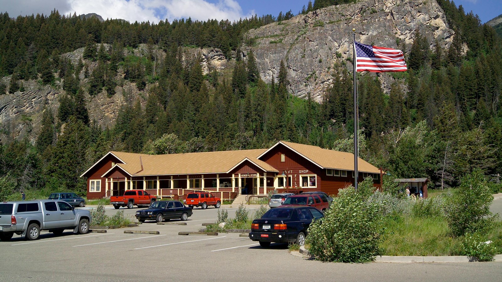 The Rising Sun Motor Inn — Red-sided with yellow lettering saying its name.