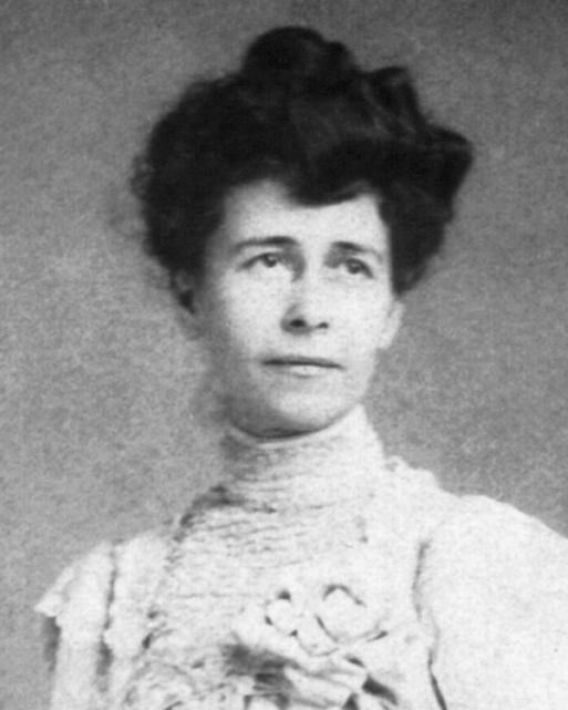 Black and white photograph of Anna Jarvis, a white woman with dark hair wearing a white dress.