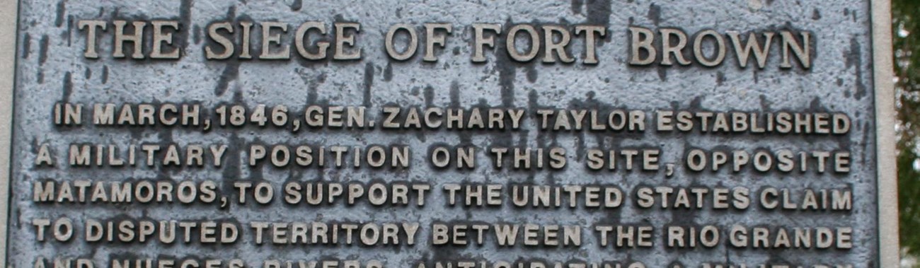 Metal historical marker for Fort Brown