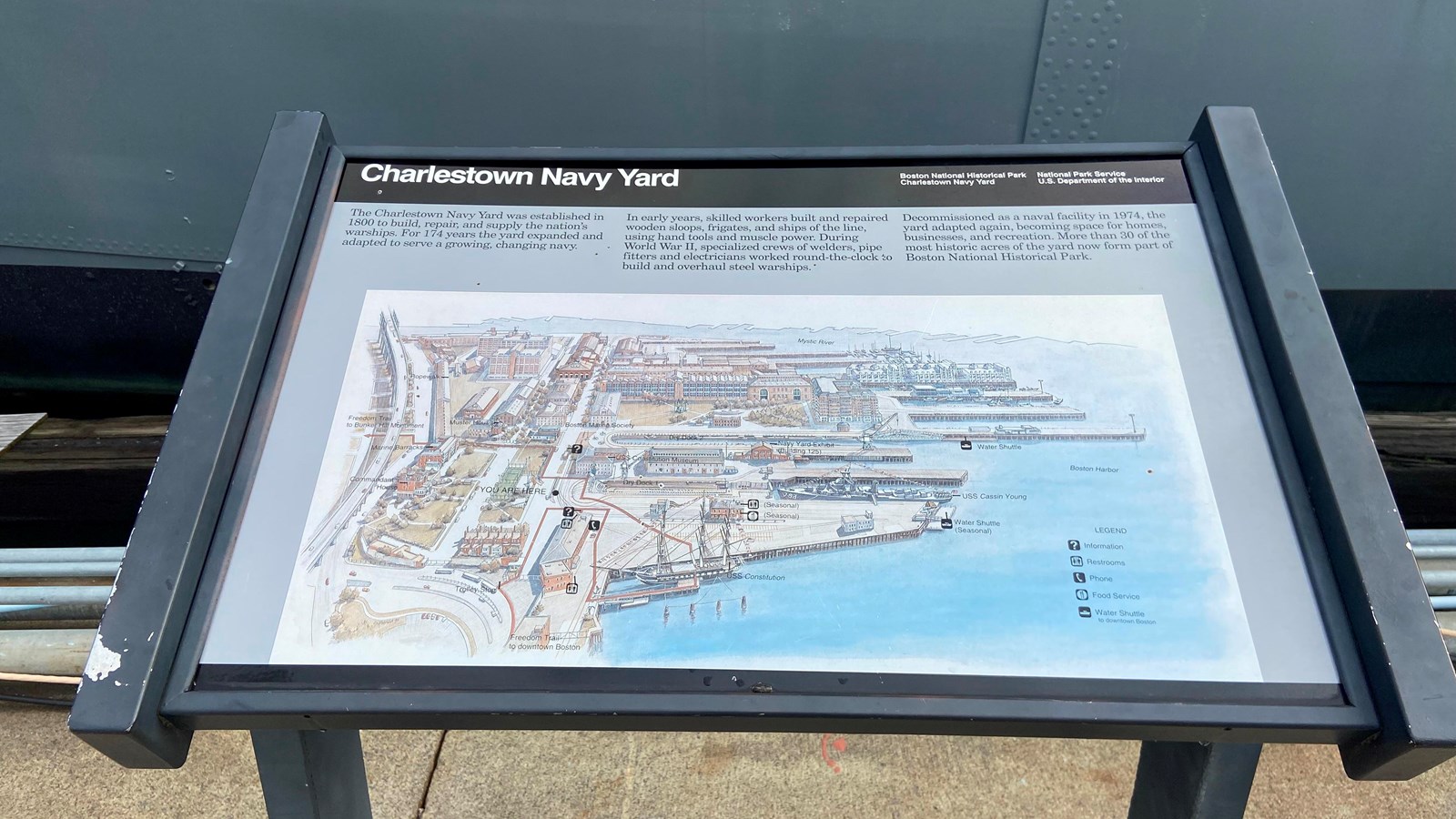 Panel with text and a color map of the Charlestown Navy Yard.