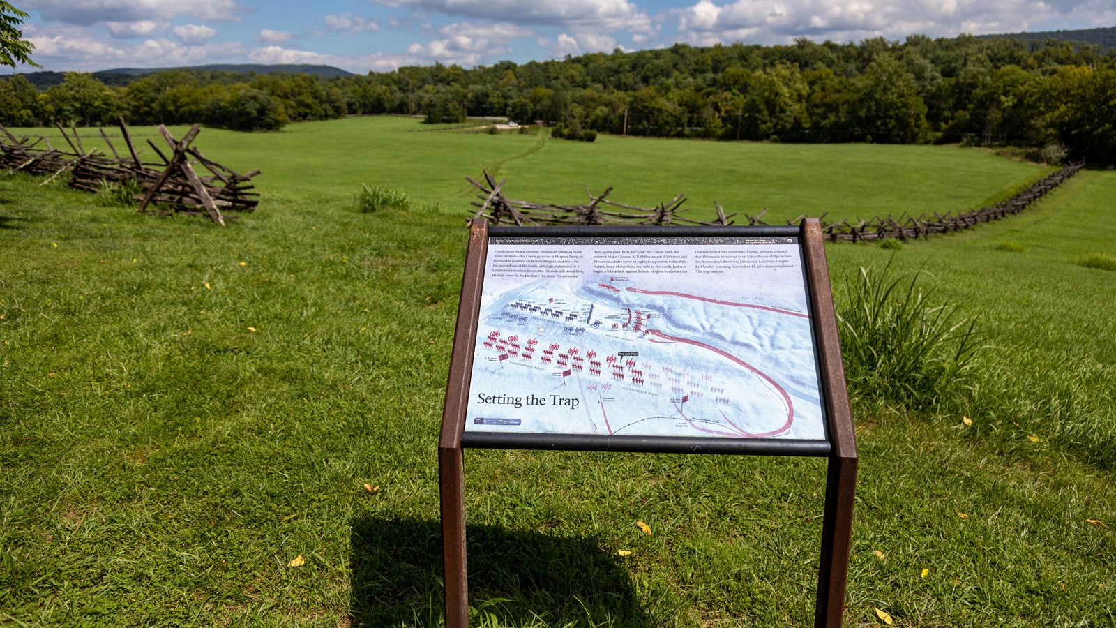 Information panel with map of Confederate battle position facing Union set in an open field.