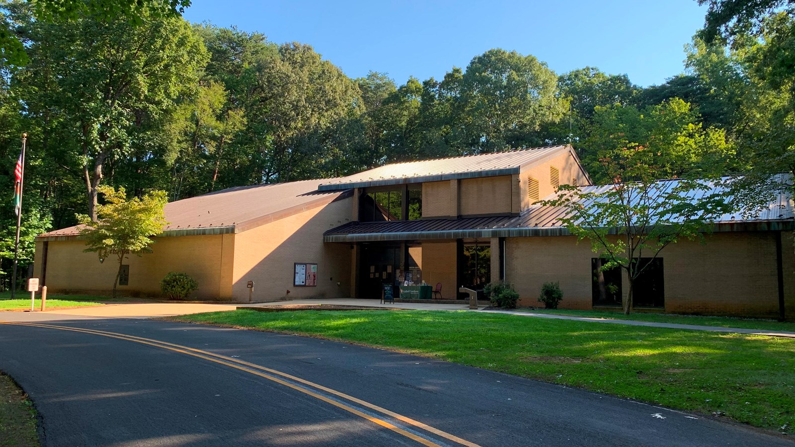 Image of the exterior of a brick visitor center.