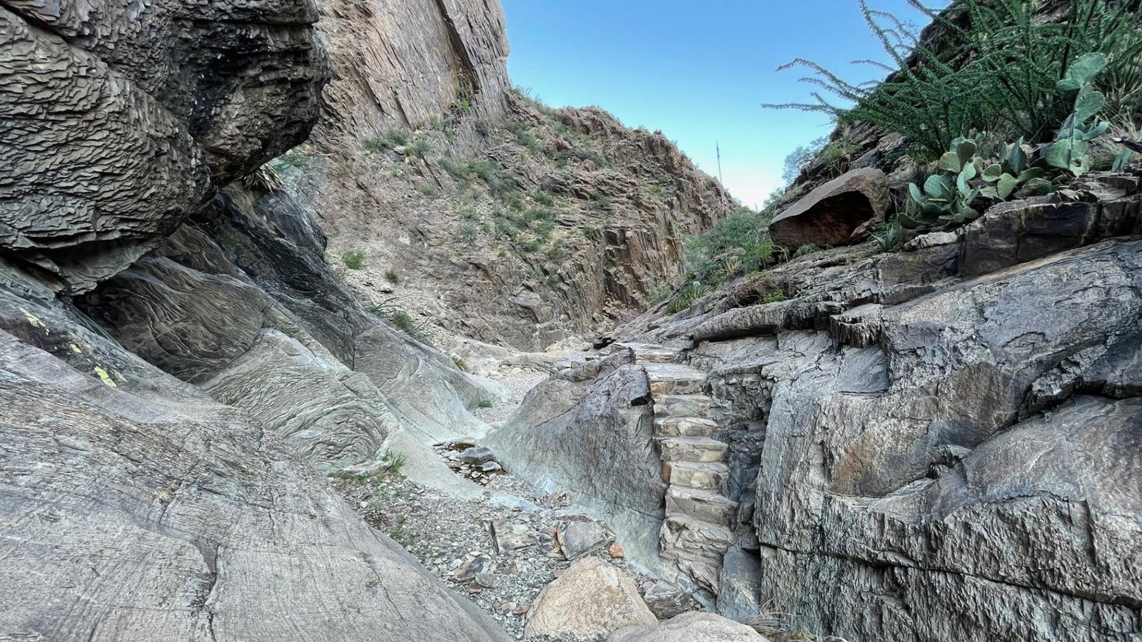 Cemented rock steps have been laid over water polished bedrock.