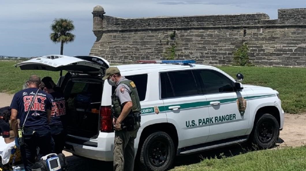 Law Enforcement SUV with fort in the background