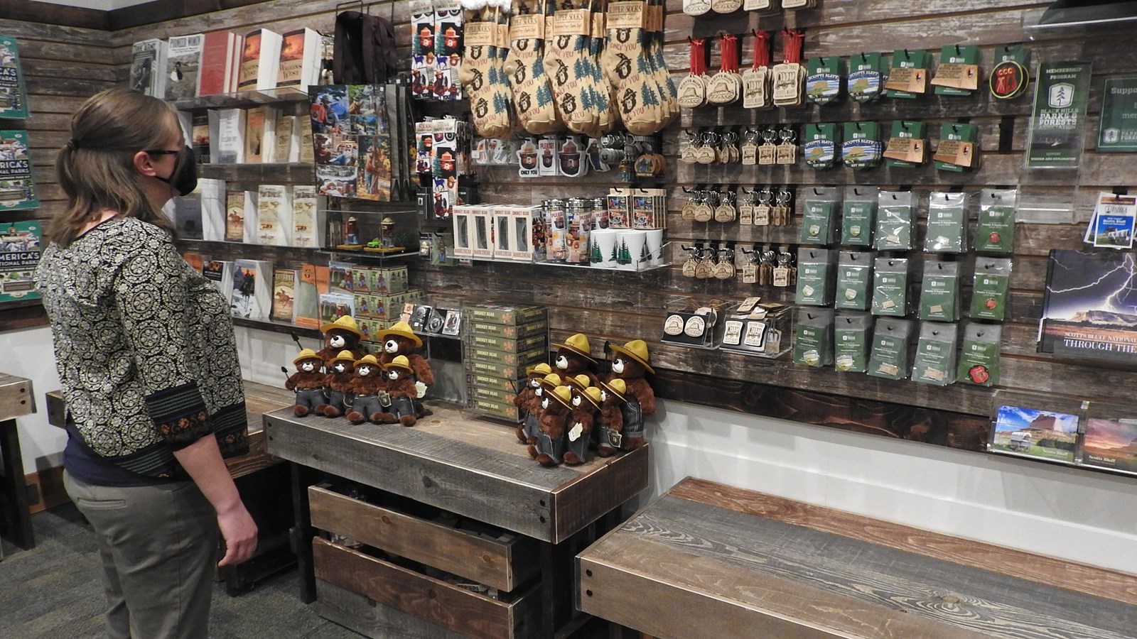 A woman looks at the merchandise in the Park Store.