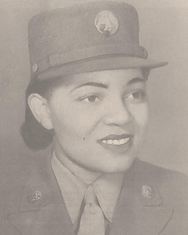 Black and white photo of African American women in WW2 military uniform including hat.