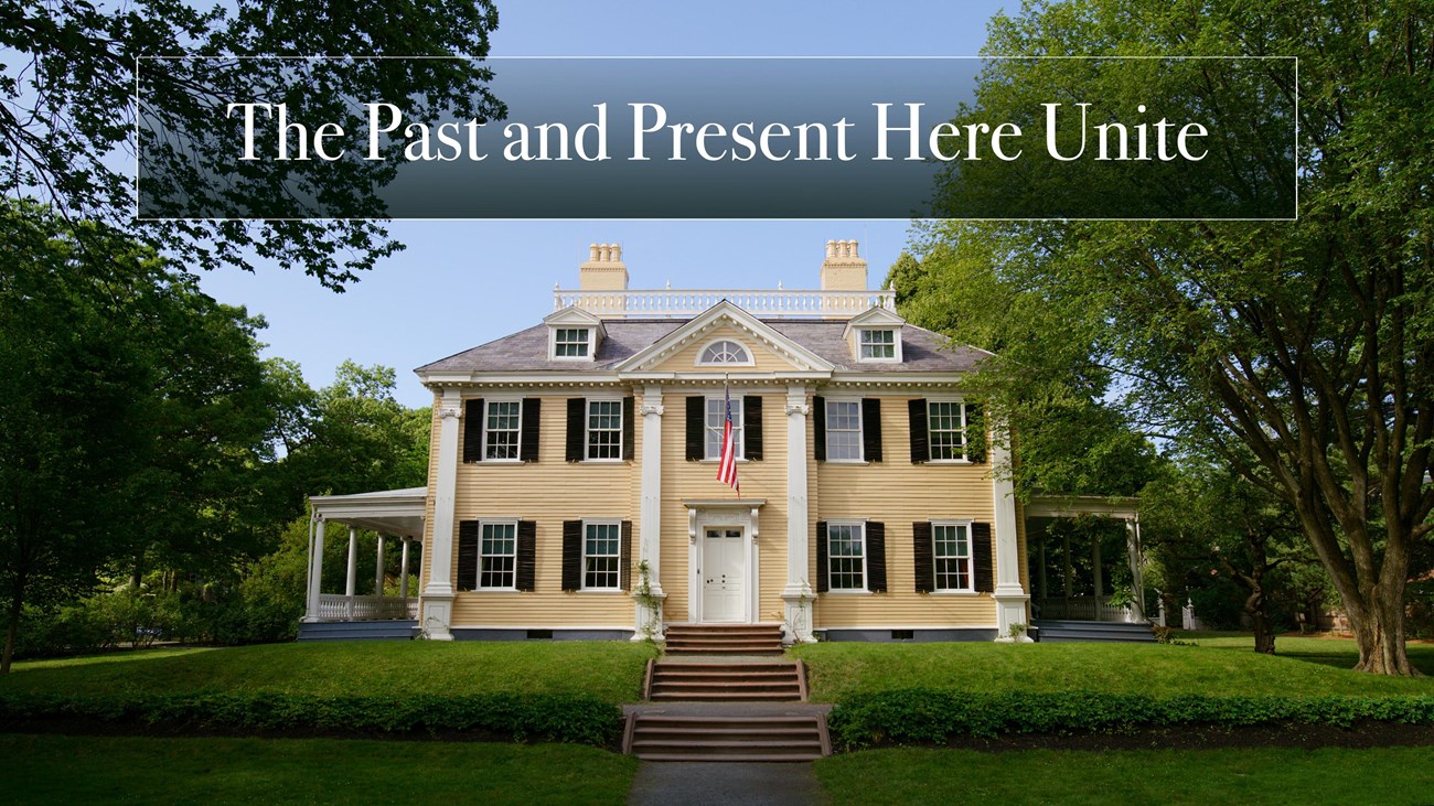 Still from a video showing the front facade of a yellow mansion with title bar