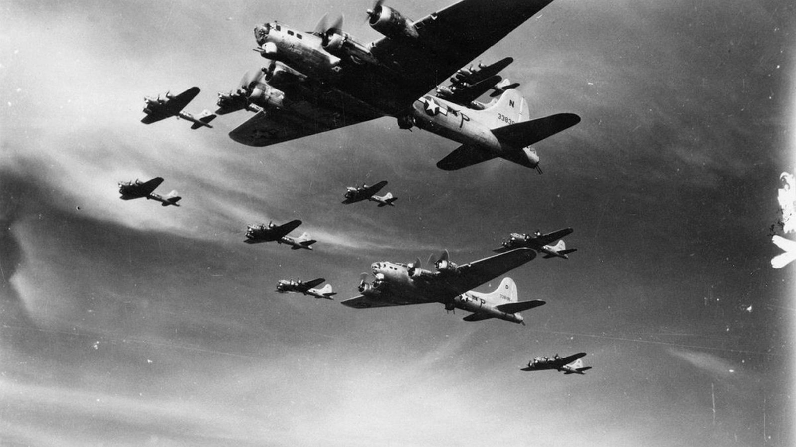 Large metal flying vehicles in a formation 
