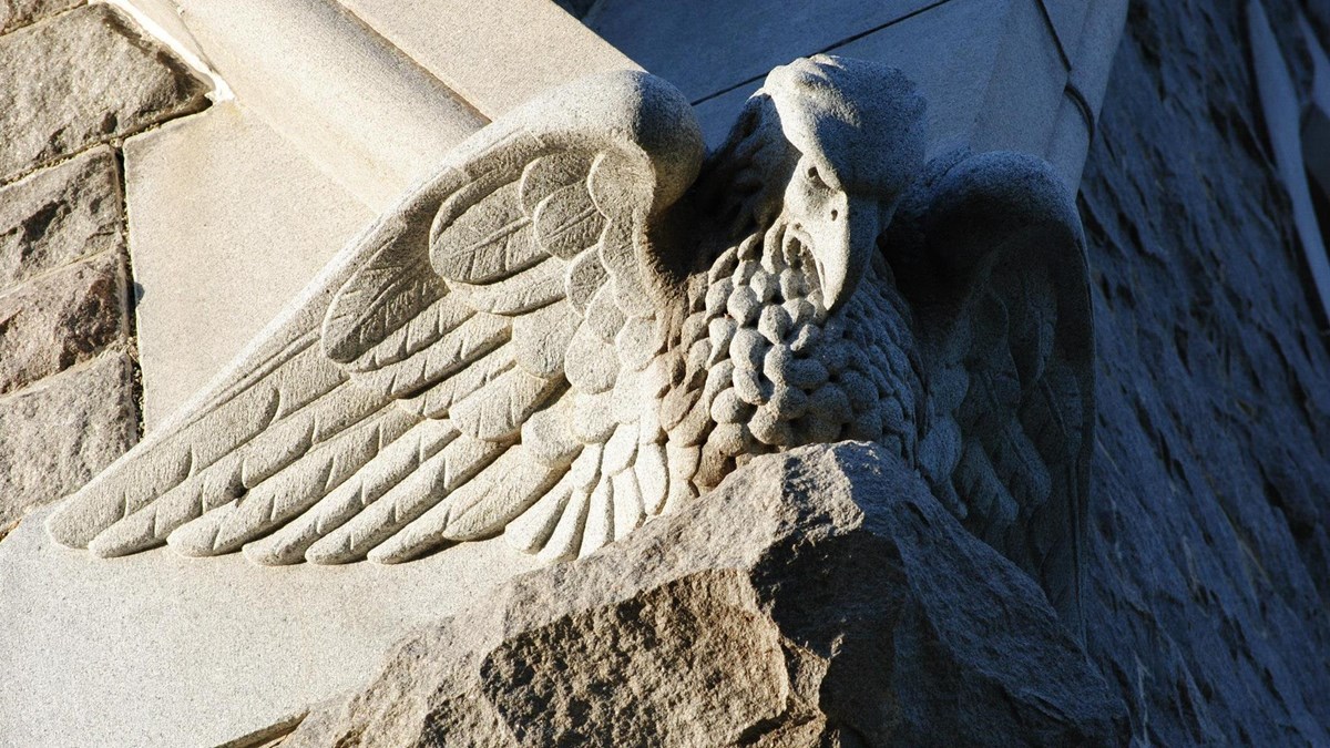 eagle carved into granite