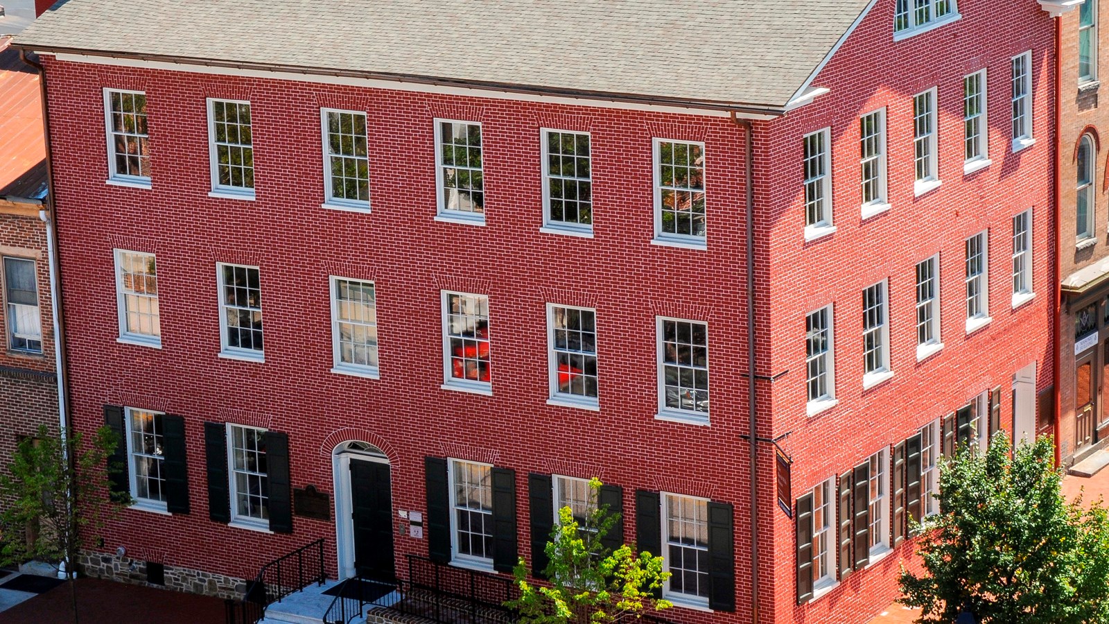 A Brick building near the center of town