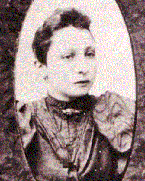 black and white photo of a woman in a dress