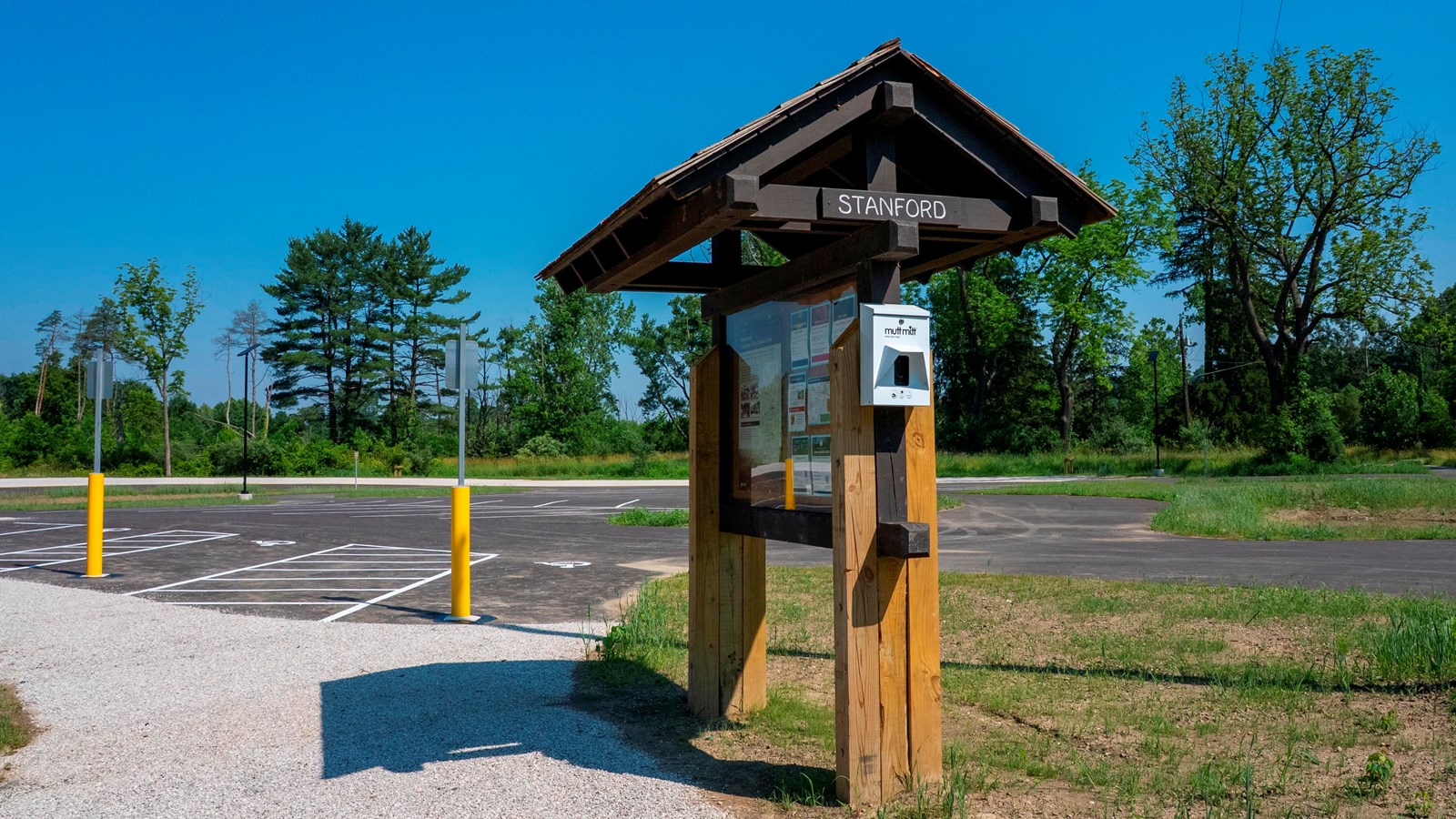 A wooden kiosk with a roof labeled 