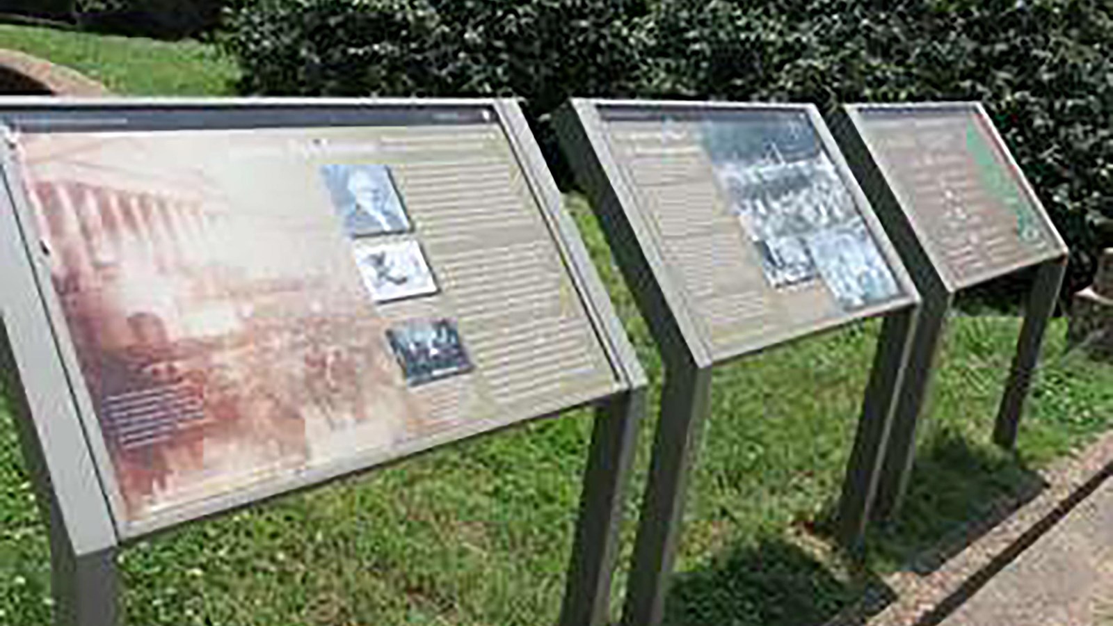 Three wayside panels in the park.