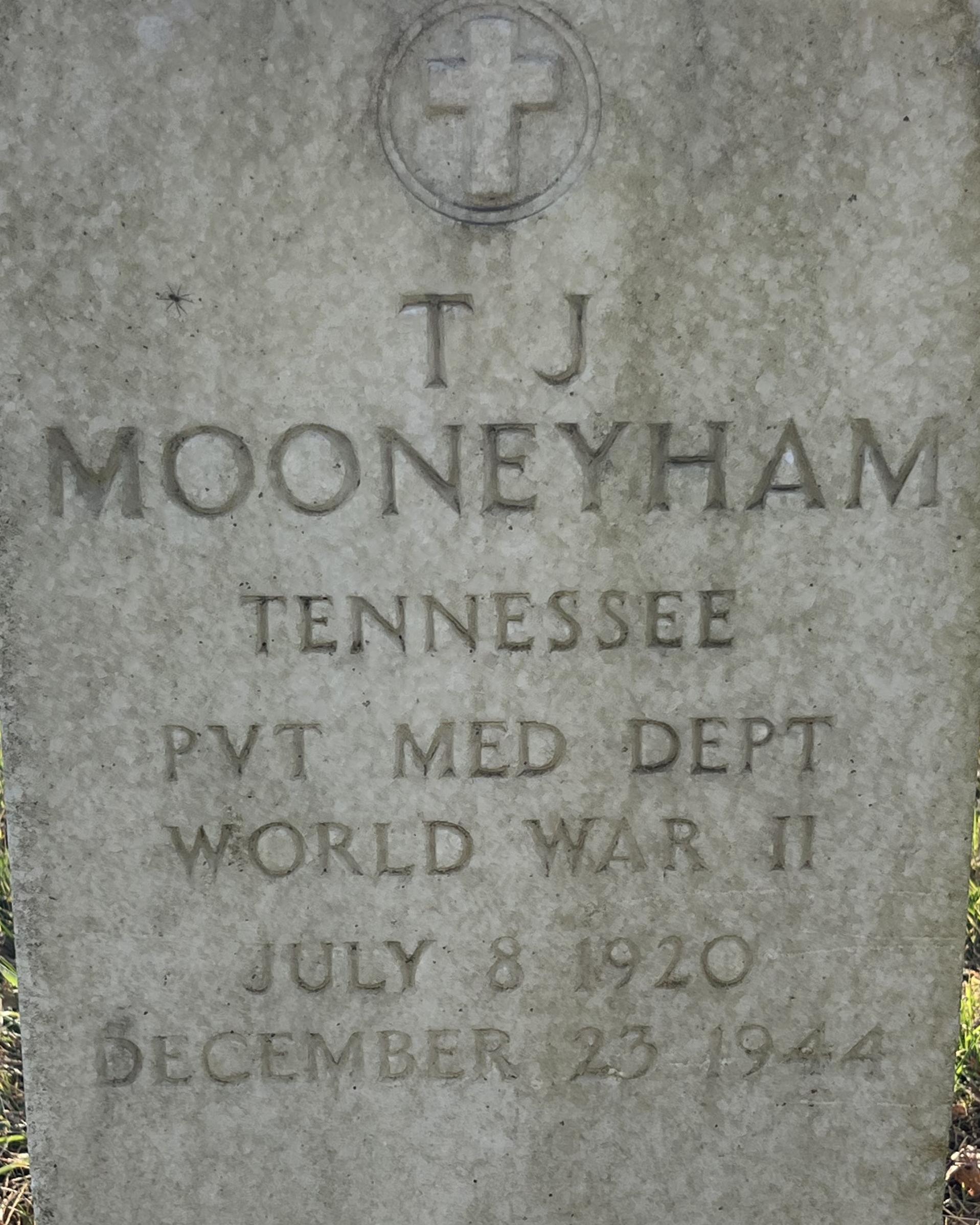 Marbled headstone belonging to Thomas Mooneyham located in the Stones River National Cemetery.