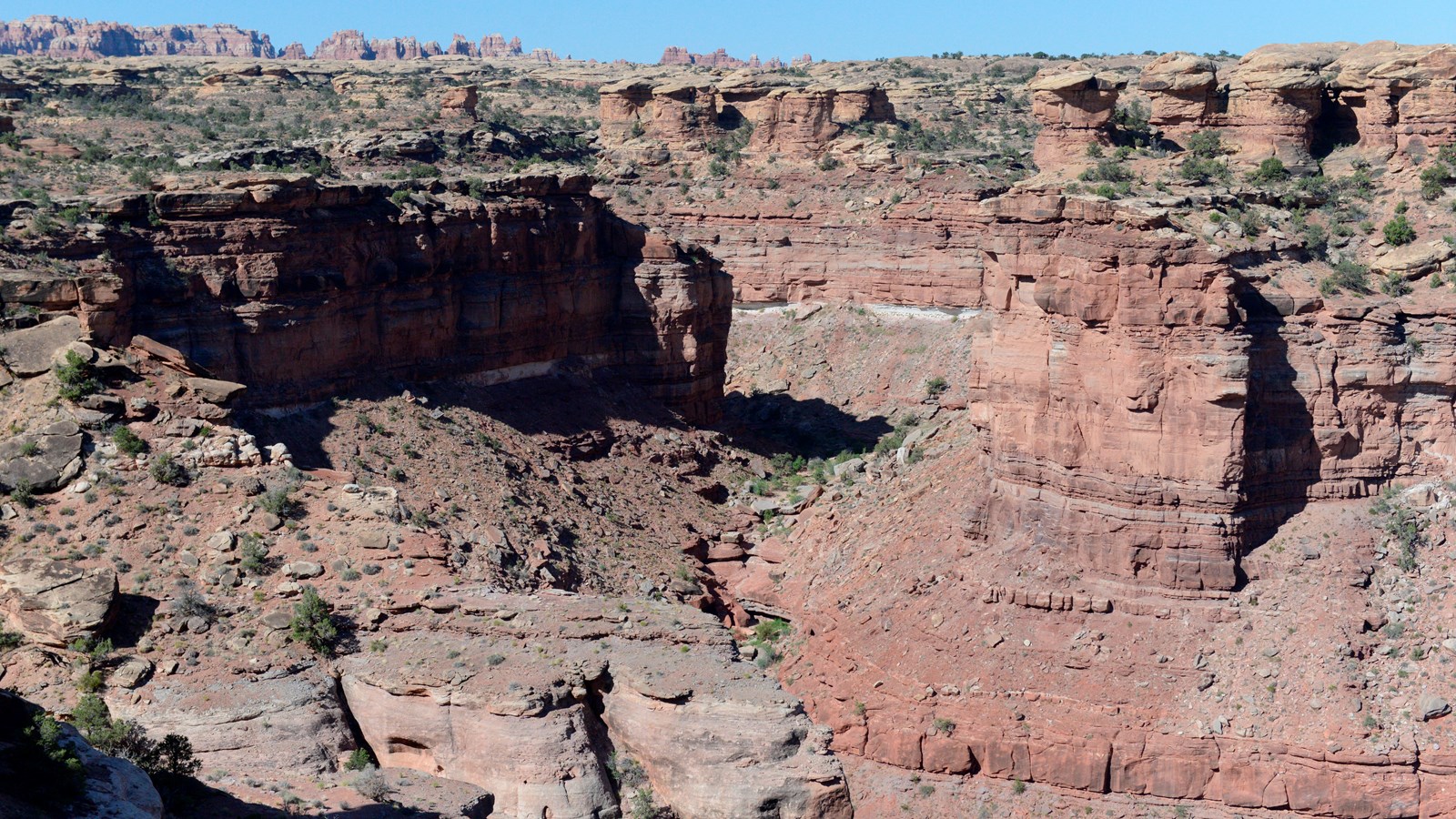 A landscape photograph of a colorful geologic landscape.