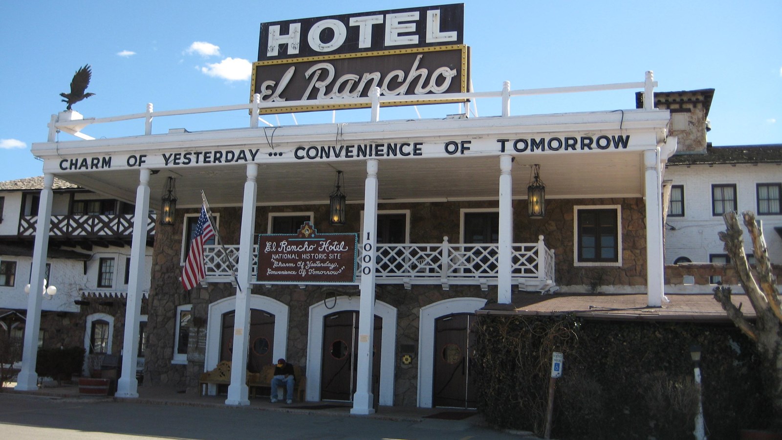 The El Rancho Hotel is built of brick, random ashlar stone, and roughhewn wood.
