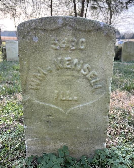 The headstone of William Kensell, a private buried in Stones River National Cemetery. 