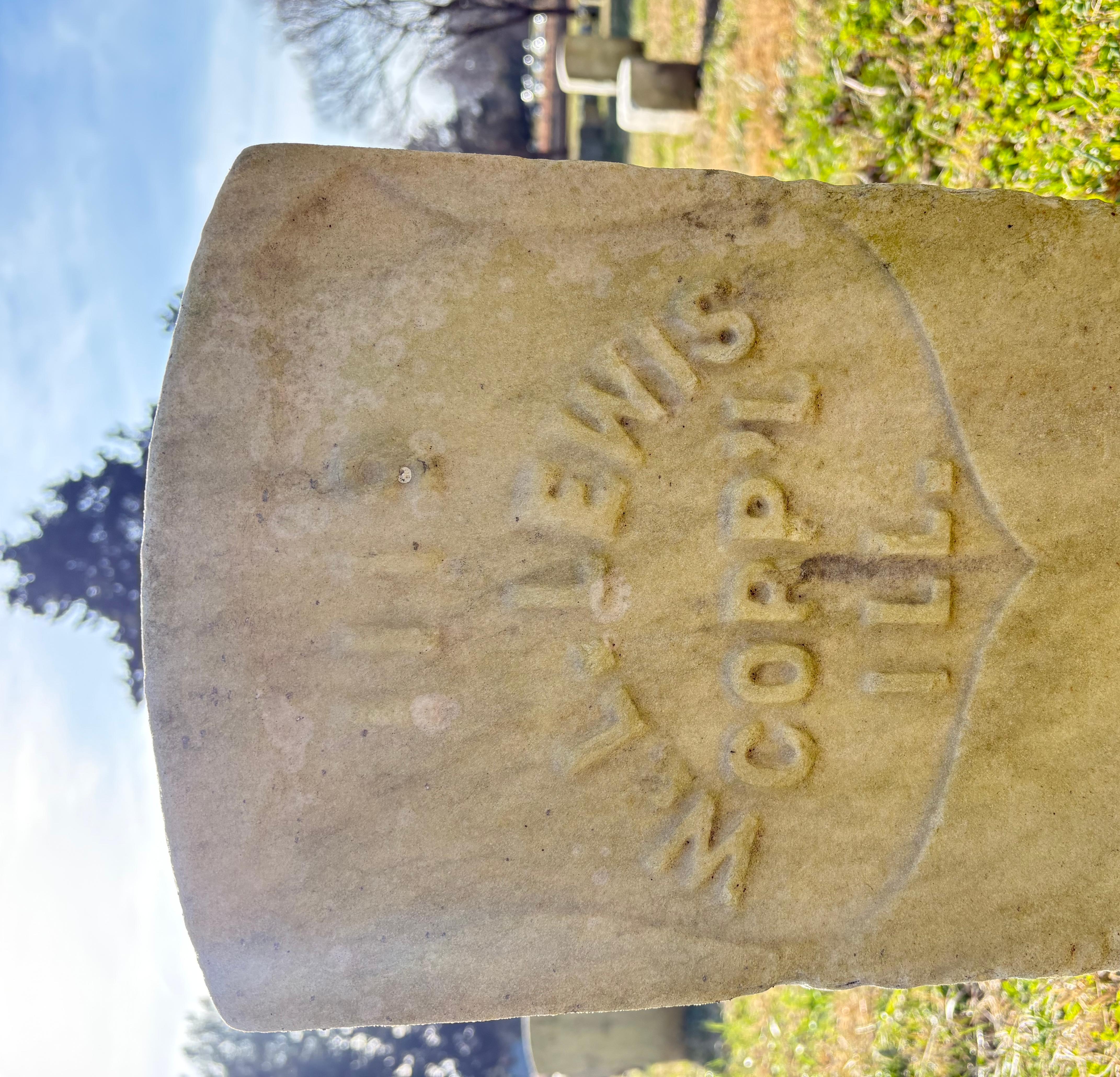 The headstone of William L Lewis who fought at the Battle of Stones River. 