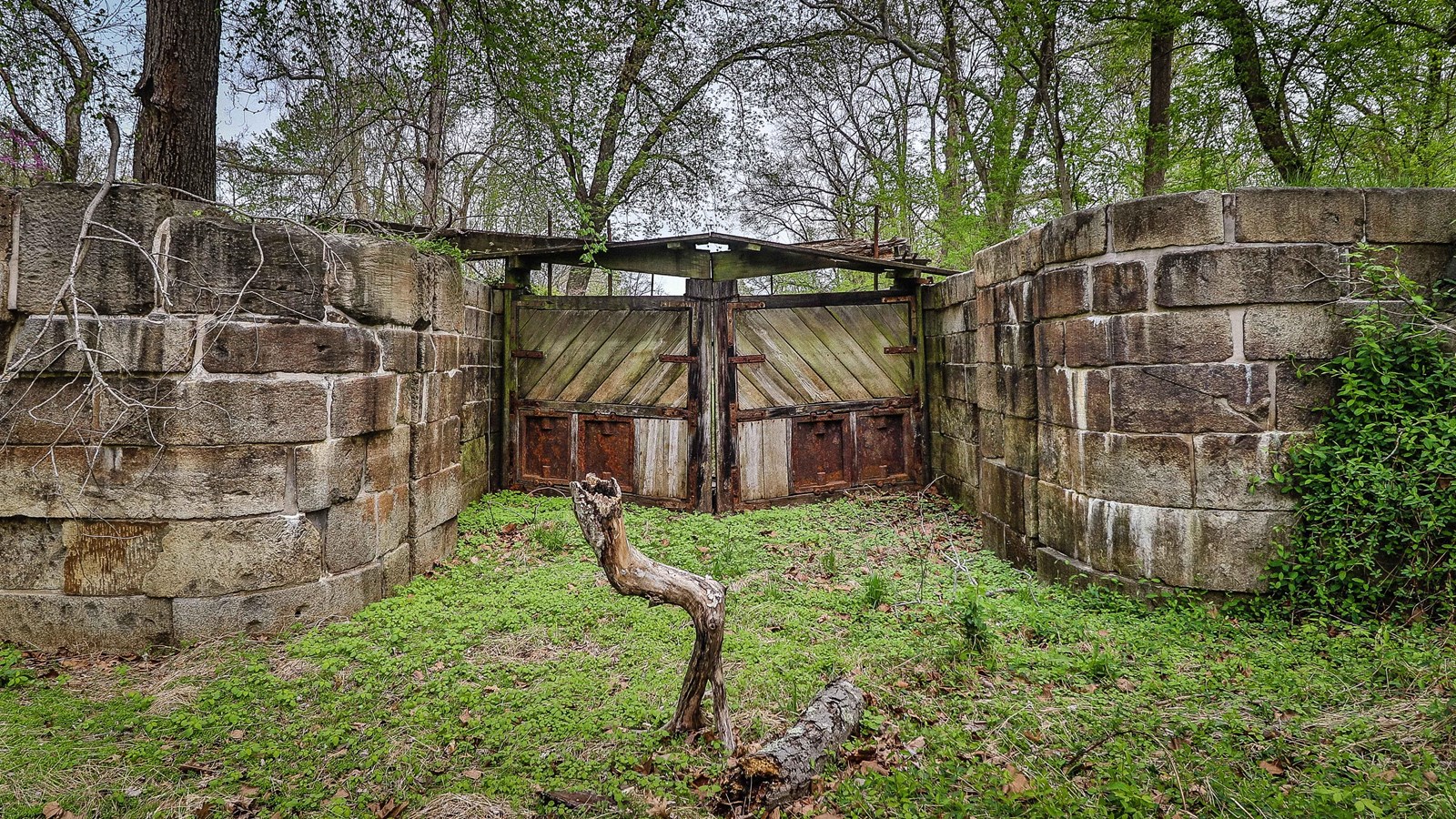 Wooden lock gates stand closed.