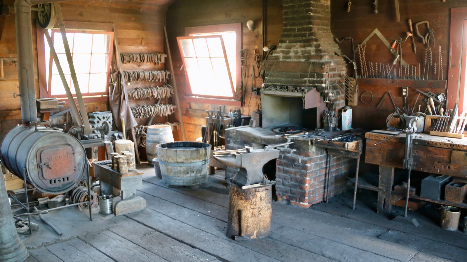 A variety of blacksmithing and carpentry tools on display inside the historic ranch repair shop.