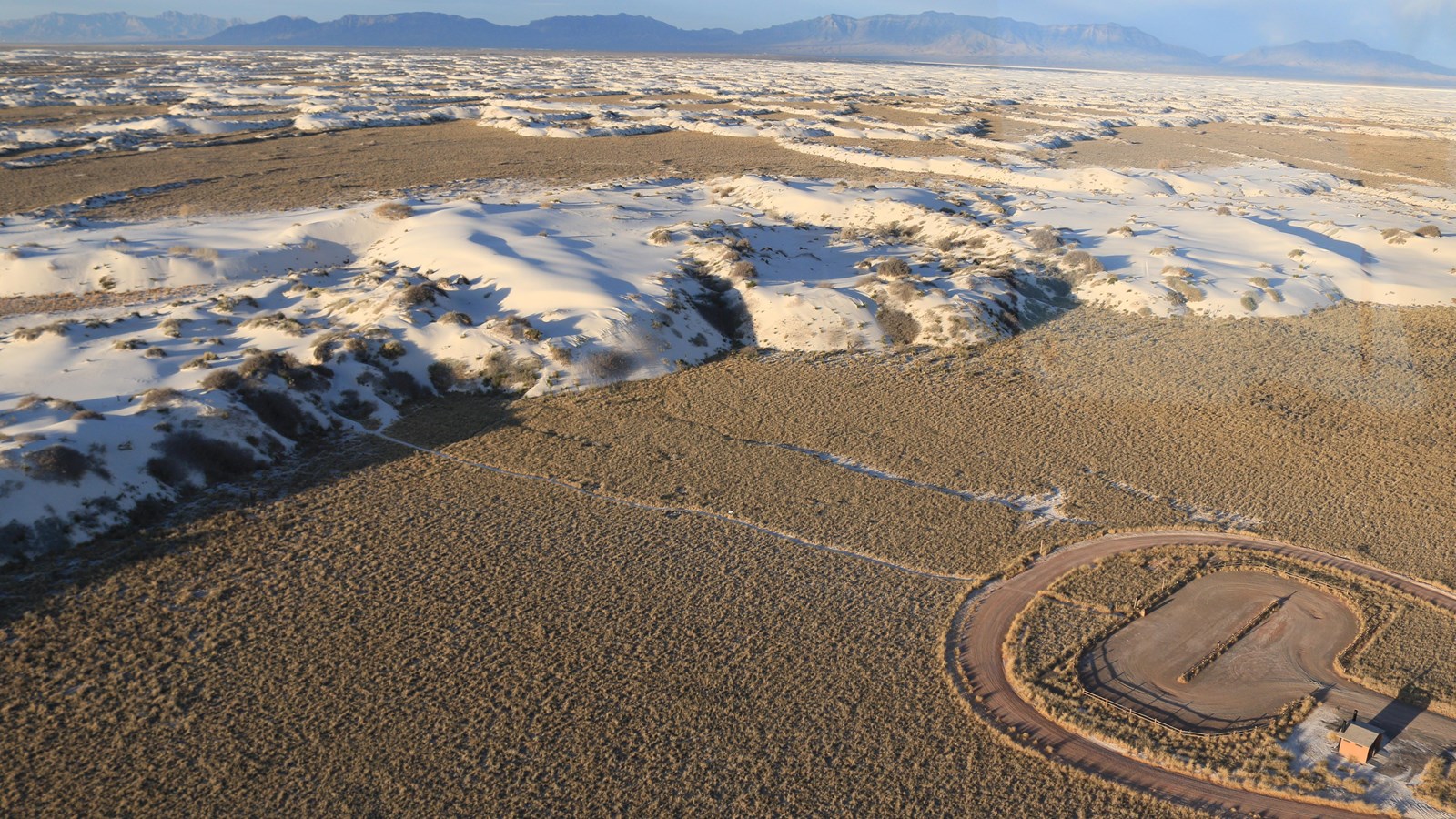 An aerial view of the Dune Life Nature Trail parking lot and trail entrance.