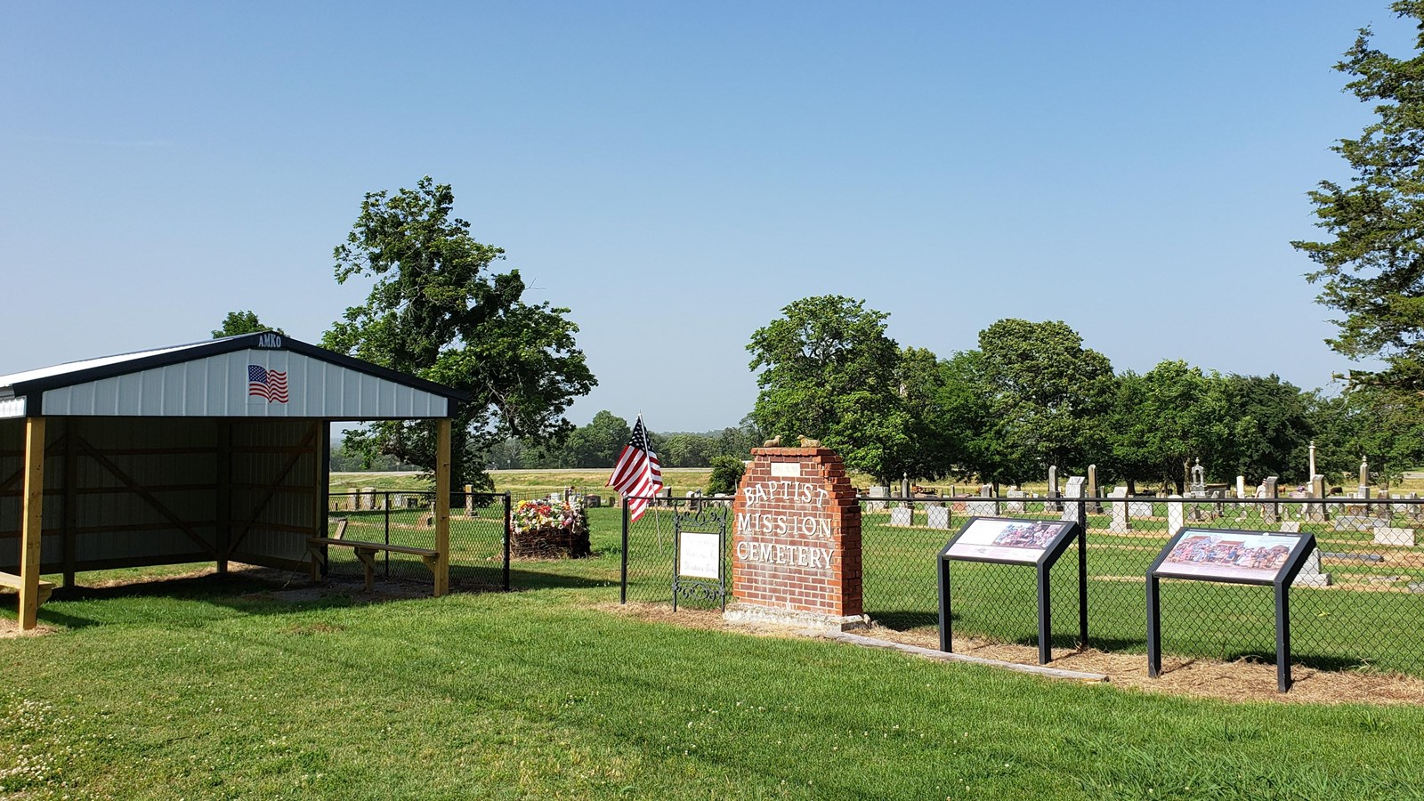 A brick sign reading 