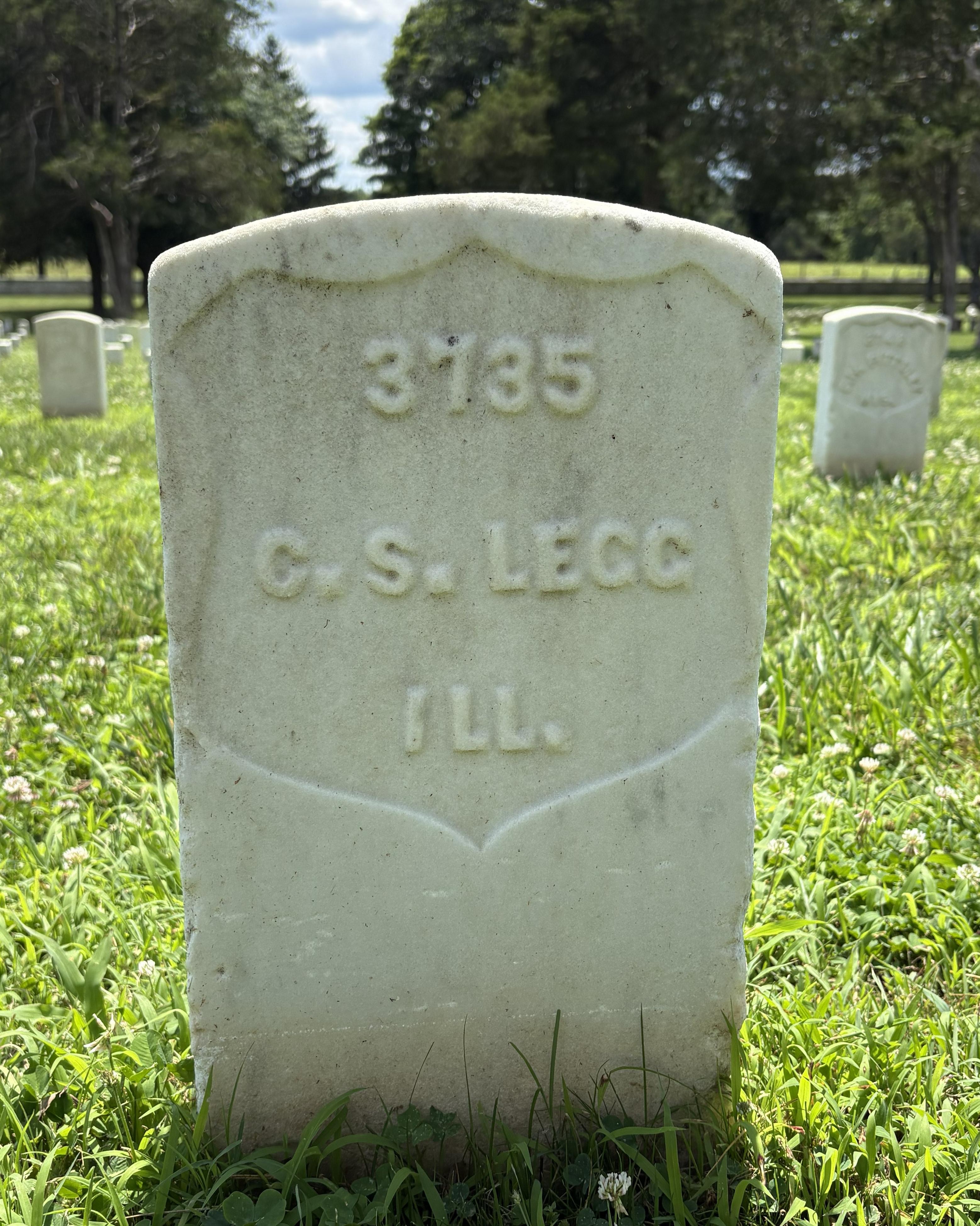 Marble headstone belonging to veteran Constantine Legg. 