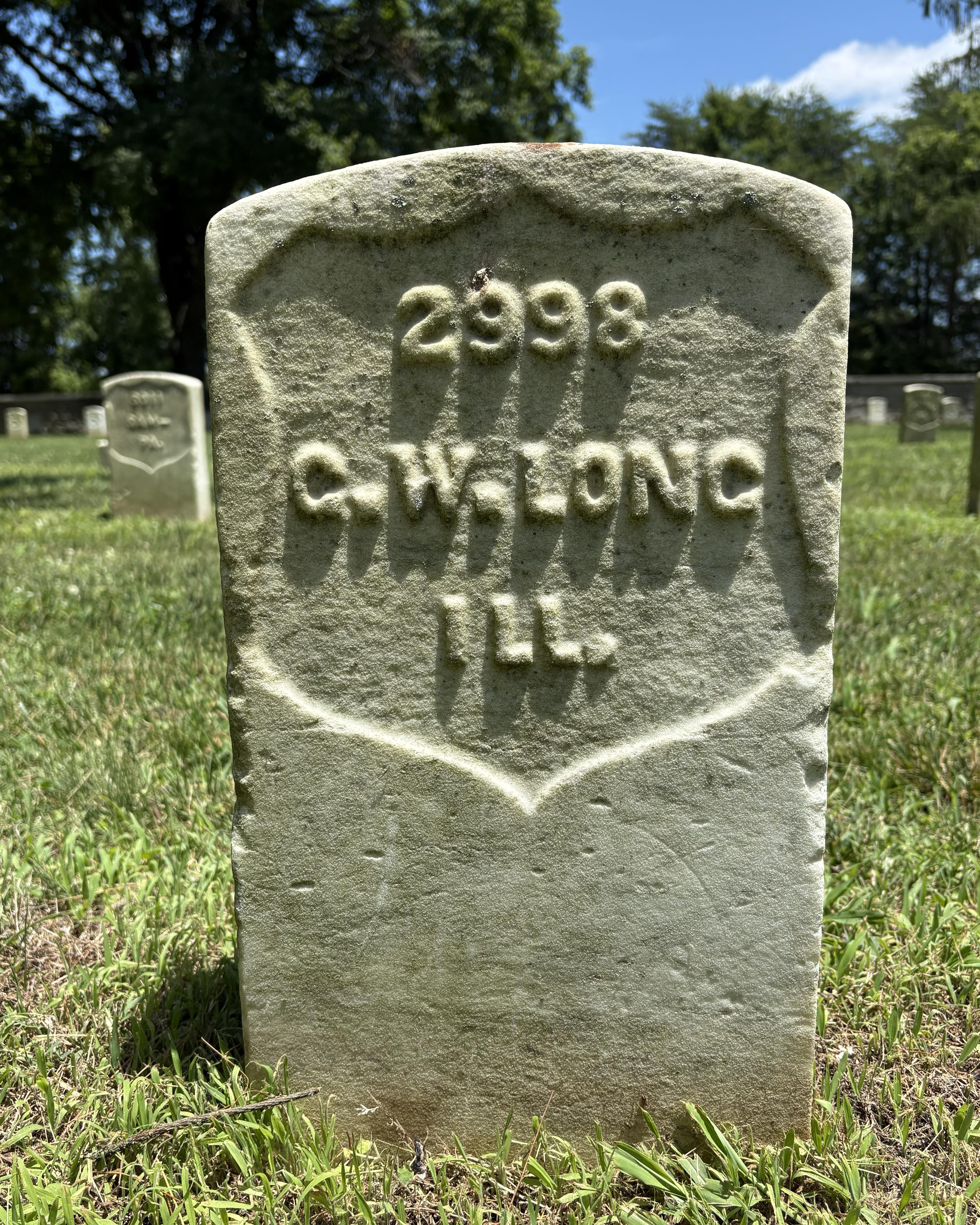Marble headstone belonging to George Long. 