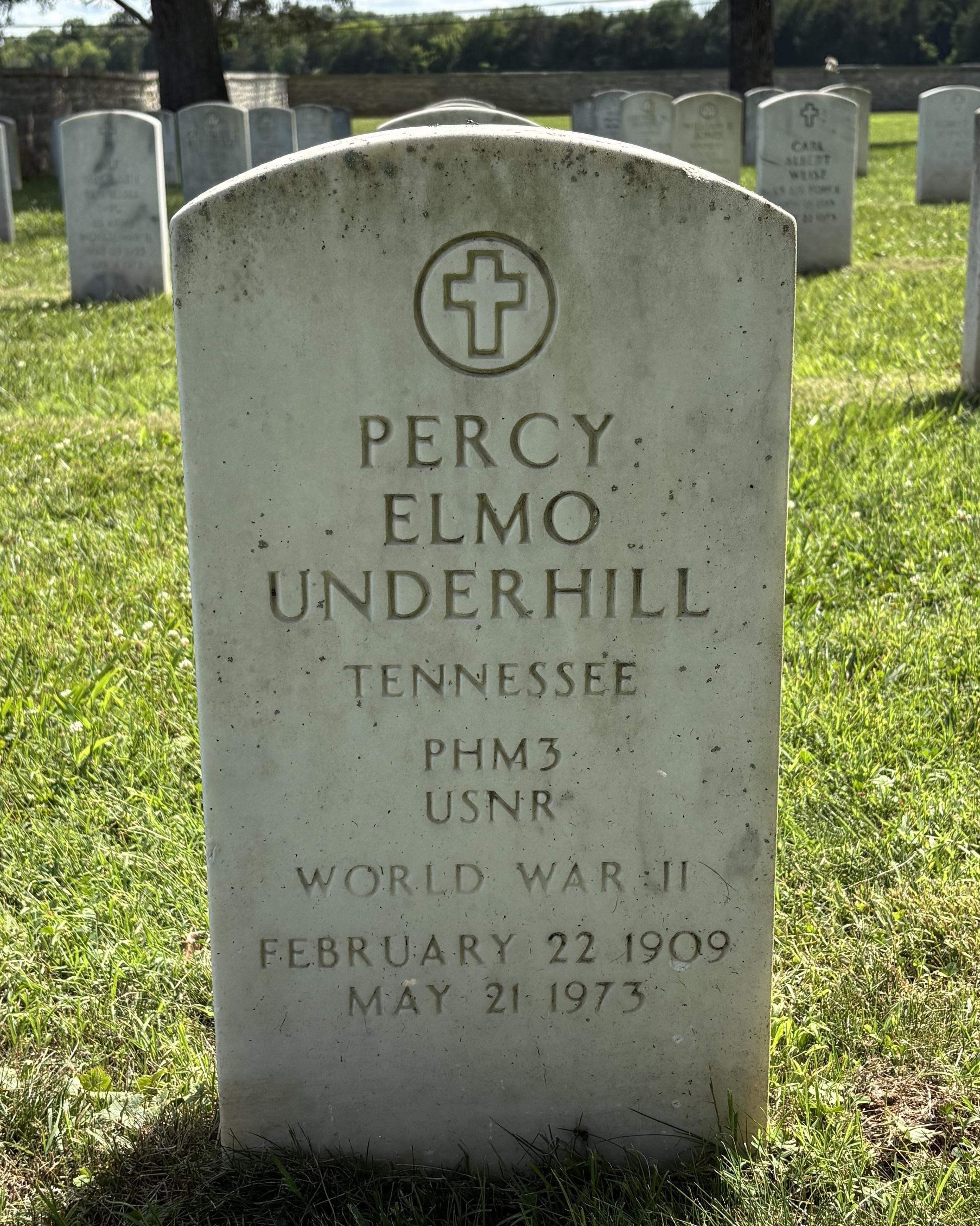 Marble headstone belonging to Percy Underhill. 