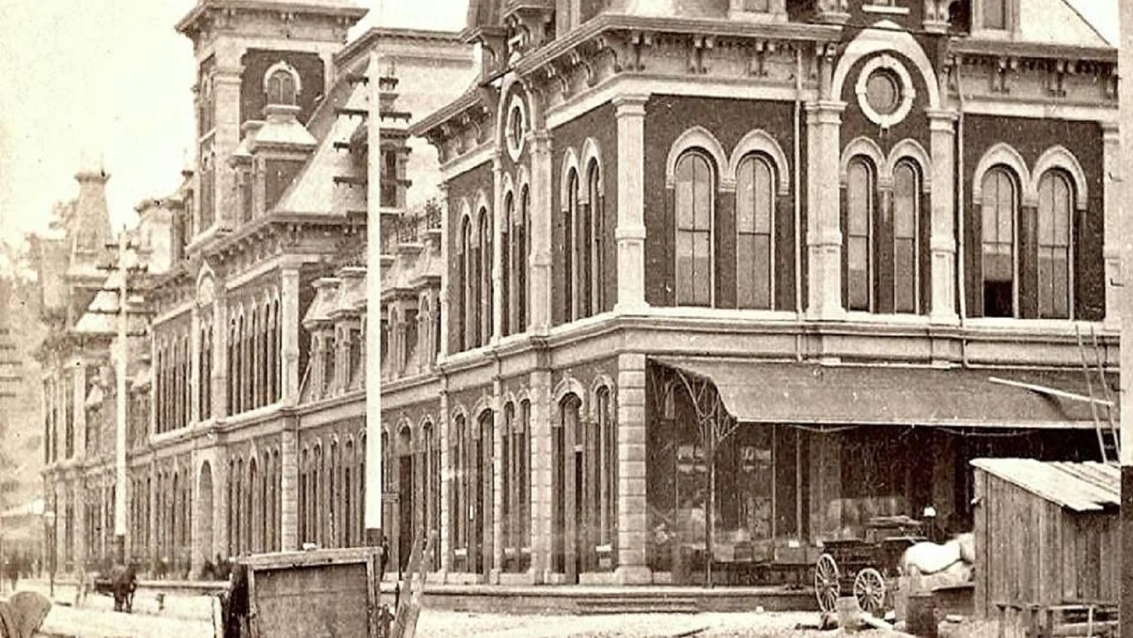 A sepia toned postcard showing the Kansas City Train Station in early 1900\'s