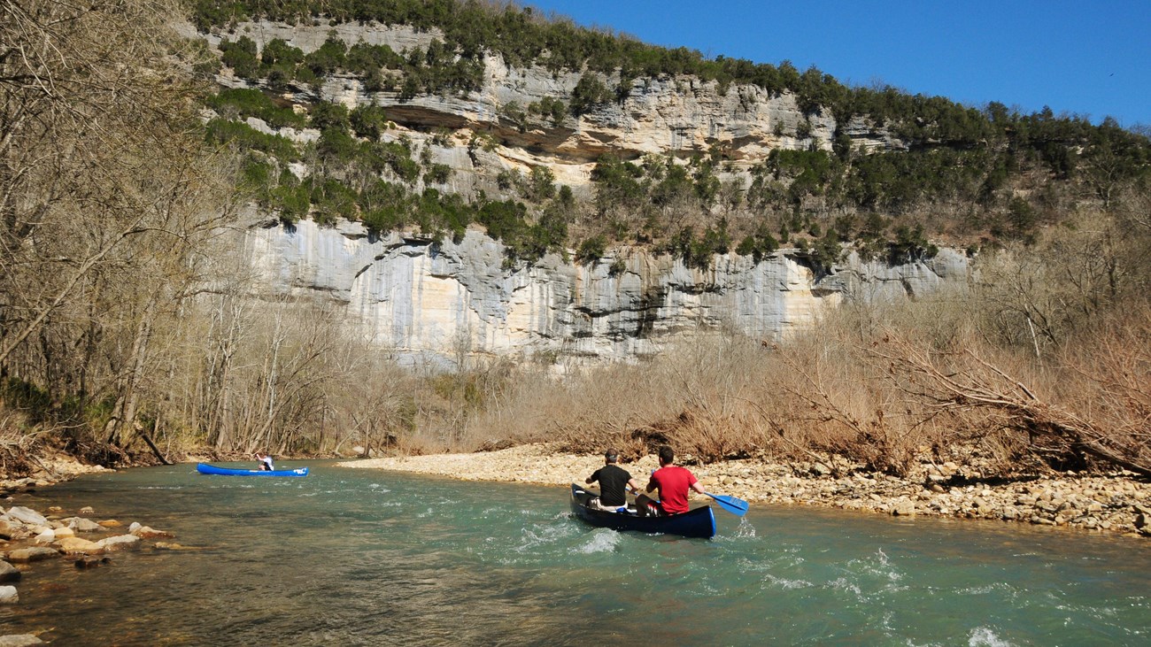 Canoeing beneath Big Bluff