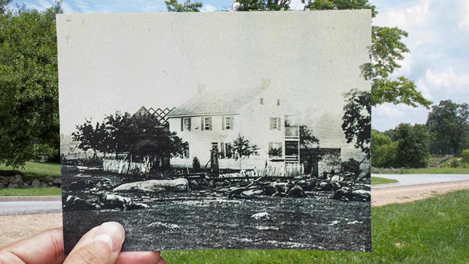 A historic photo of the Trostle House held up against the modern location of the Trostle House.
