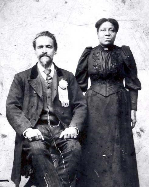 Image of an African American couple in 19th century dress.