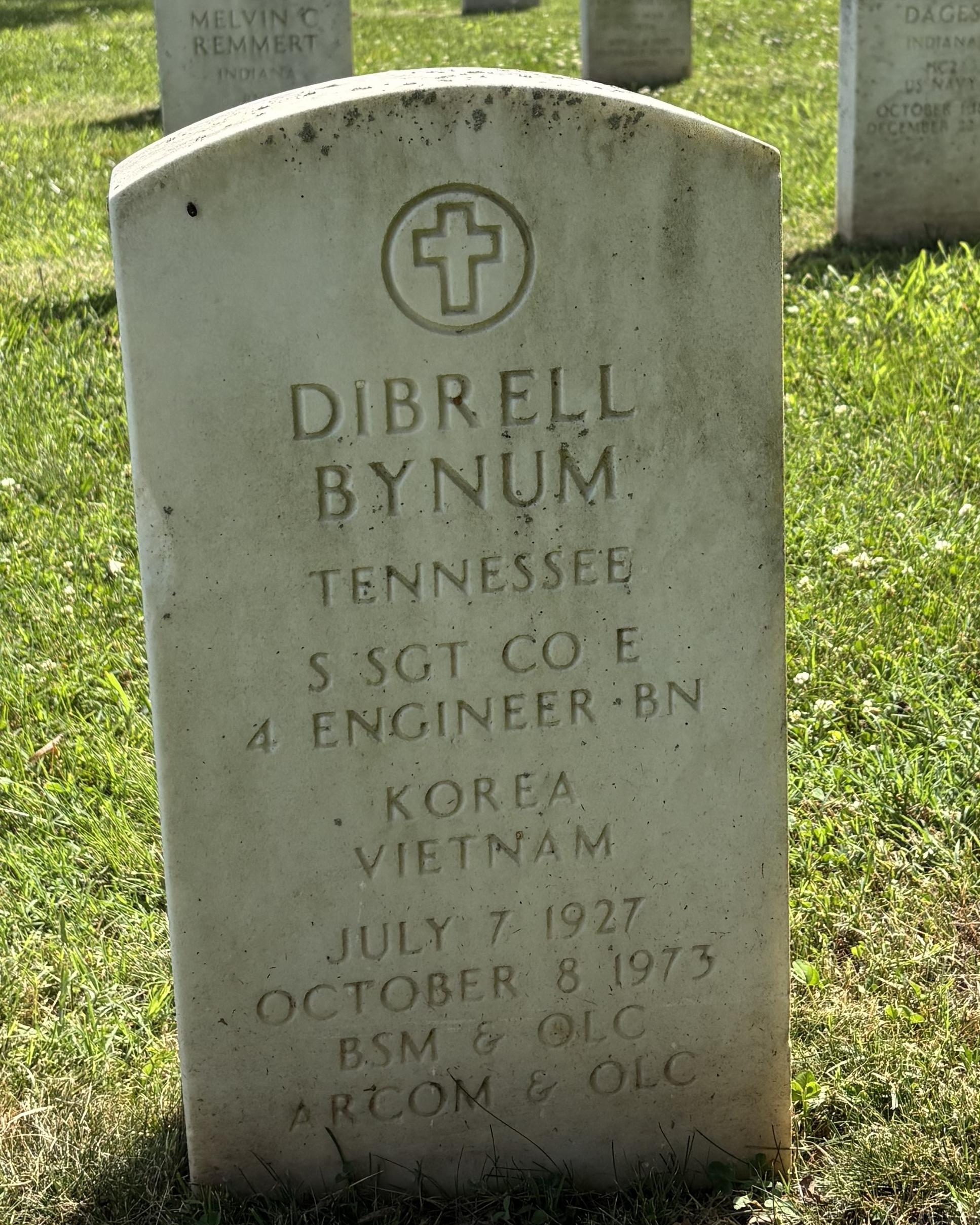 Marble headstone belonging to Dibrell Bynum. 