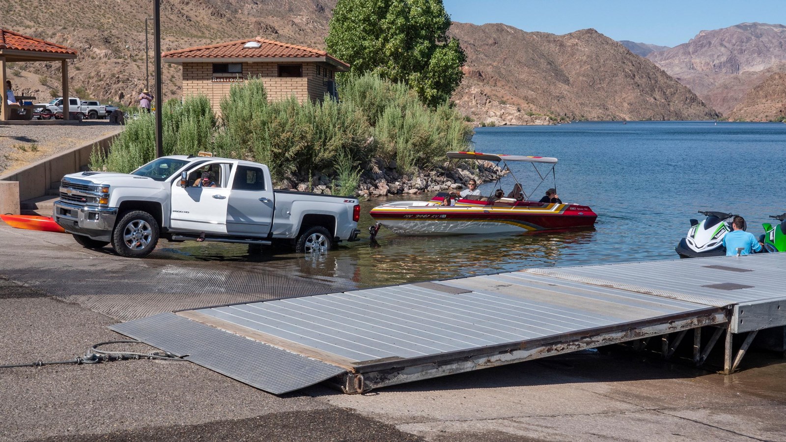 A boat launches into the water
