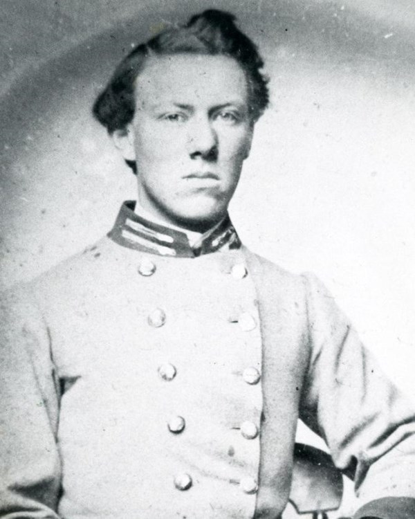 Man sitting in Confederate unifom