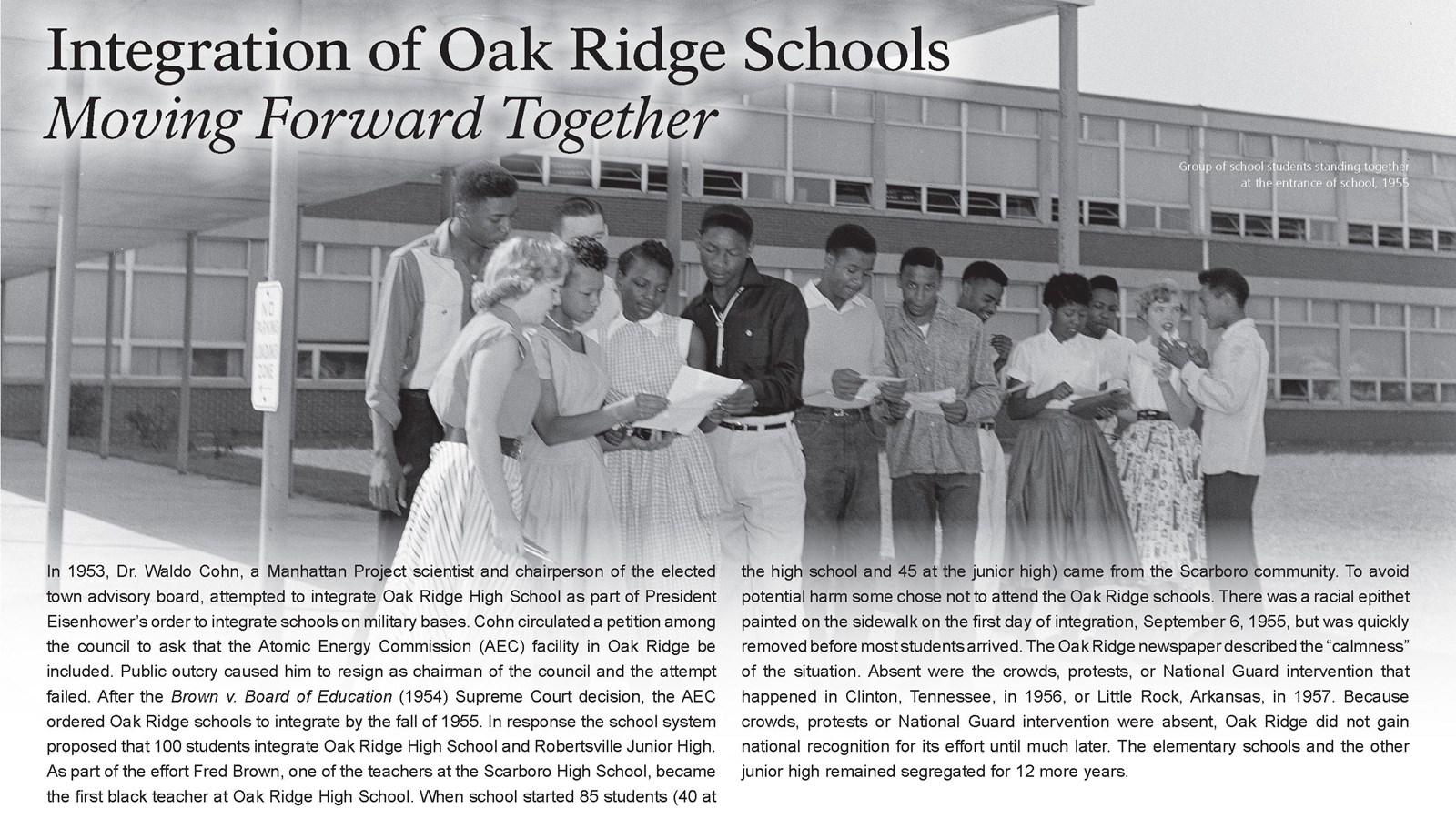 A wayside exhibit with text and a photo of Black and White high school students gathered together.