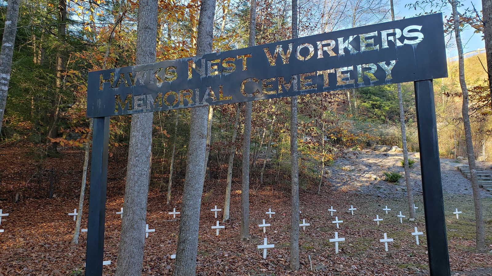 Workers memorial sign over entrence to cemetery