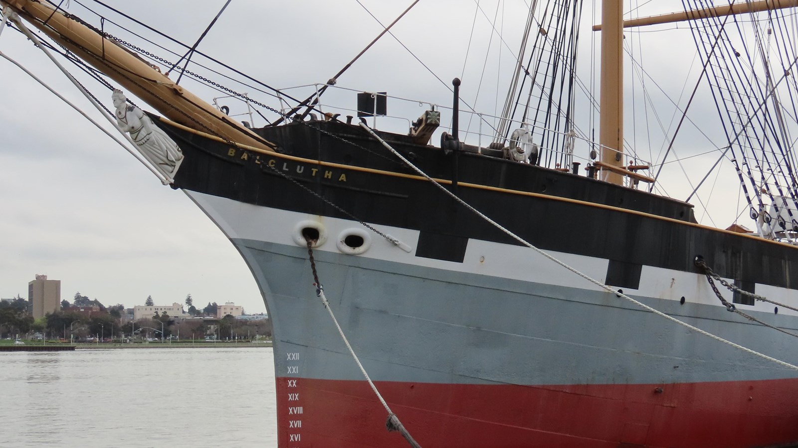 Close-up view of the bow of Balclutha, featuring the ship\'s figurehead.