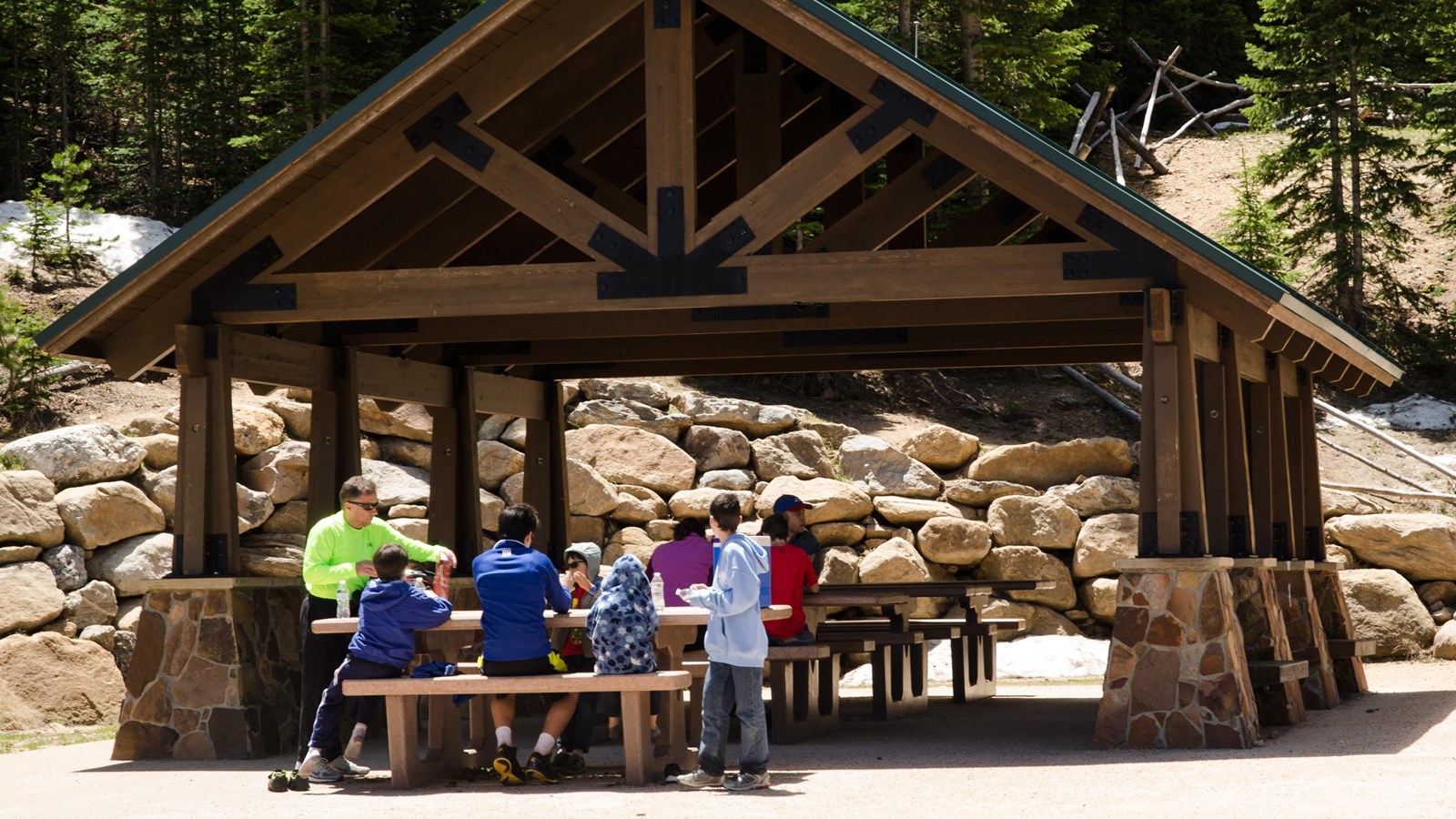 Visitors enjoying a picnic at Hidden Valley under a covered pavilion