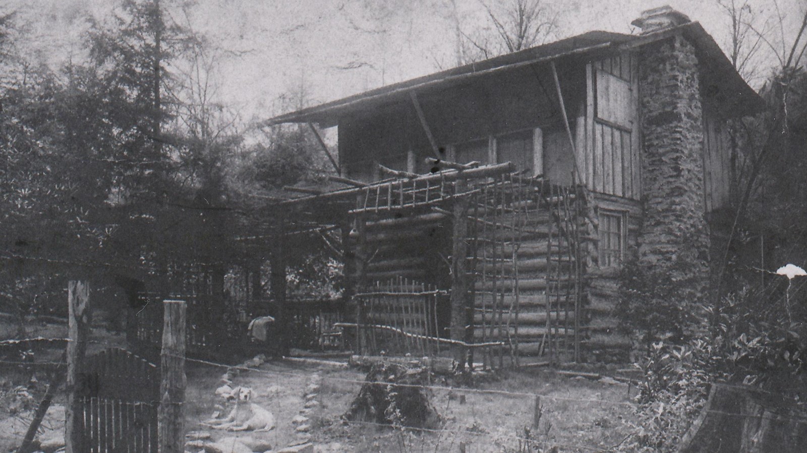 Black and white image of a cabin built in 1910