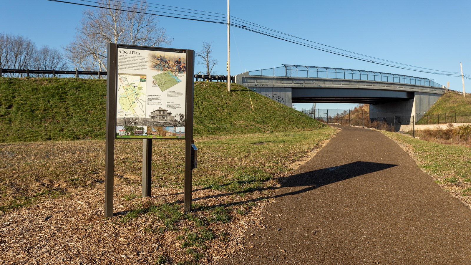 An information panel next to a trail
