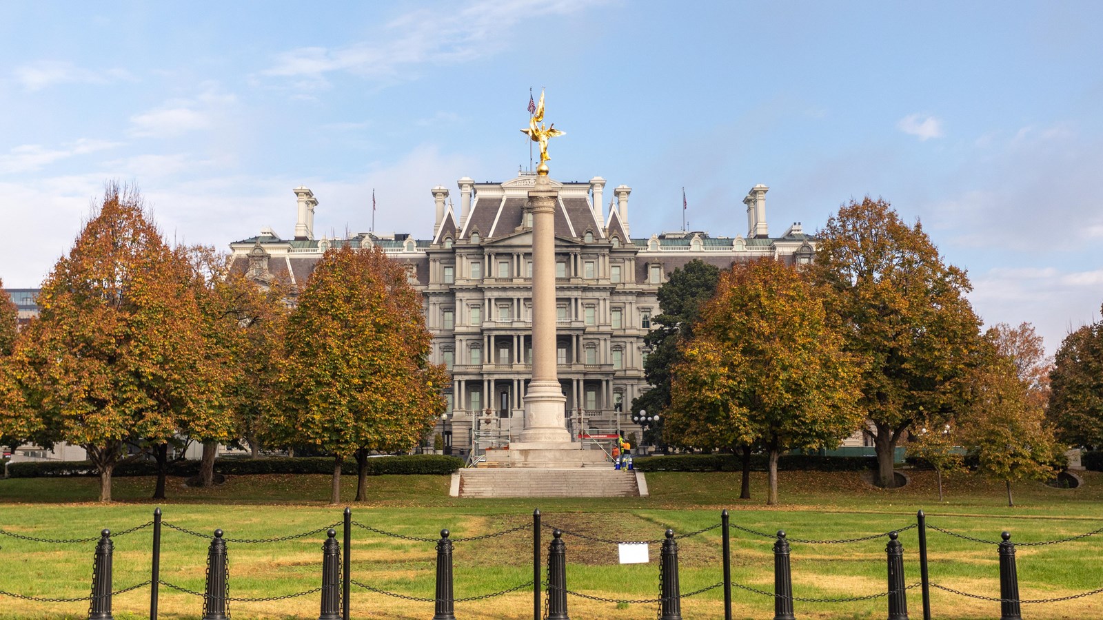 A column with a golden figure on top.