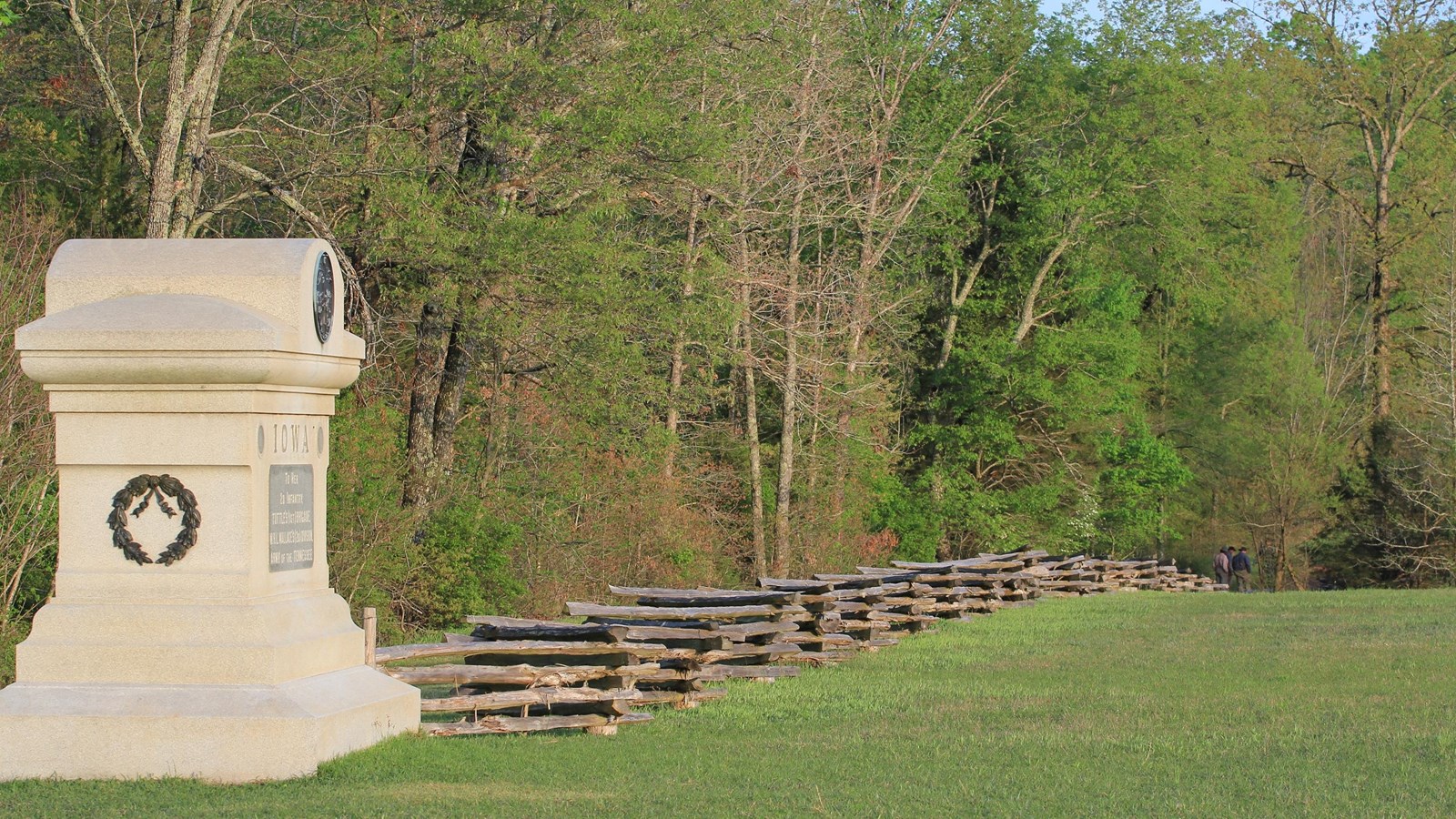 A monument and fence mark the location of the Sunken Road