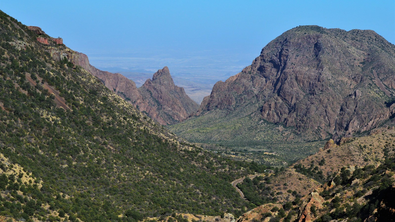 From this viewpoint one can look down on the Basin and out the Window to the low desert.