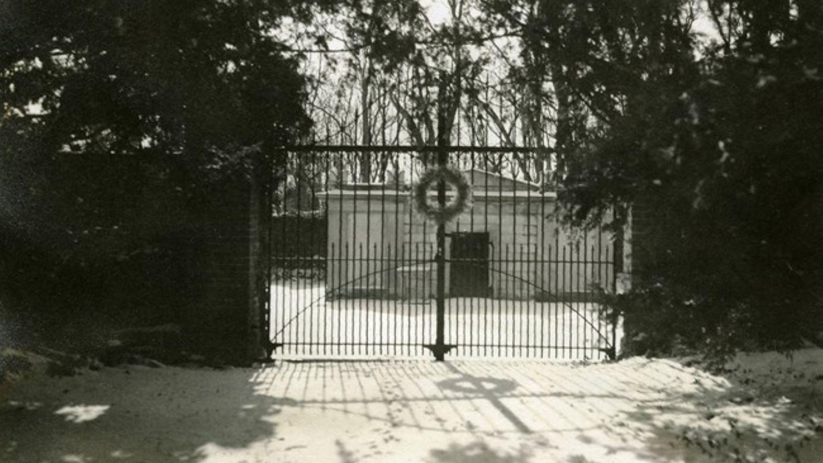 A black and white photograph of the Ridgely family cemetery.