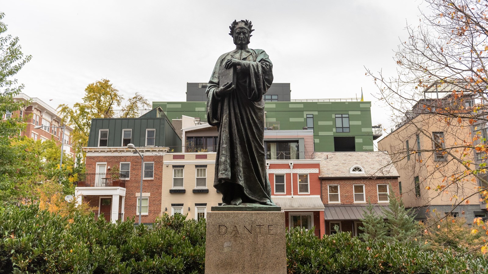 A large statue in front of a building. 